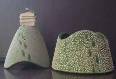 Ceramic trinket holder with a beehive on top.