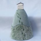 Ceramic trinket holder with a beehive on top.