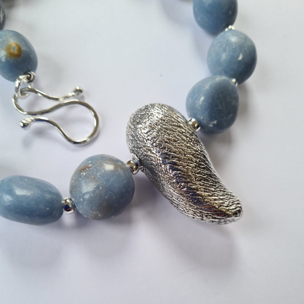 Angelite Stones with textured Silver pendant, silver beads and handmade clasp