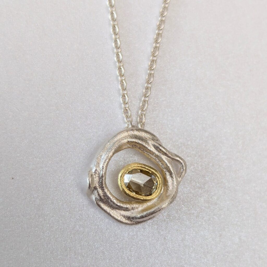 Champagne coloured diamond pendant