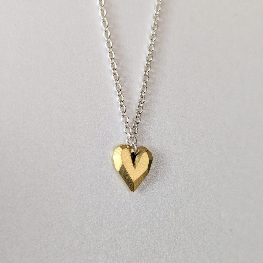 Solid gold heart pendant