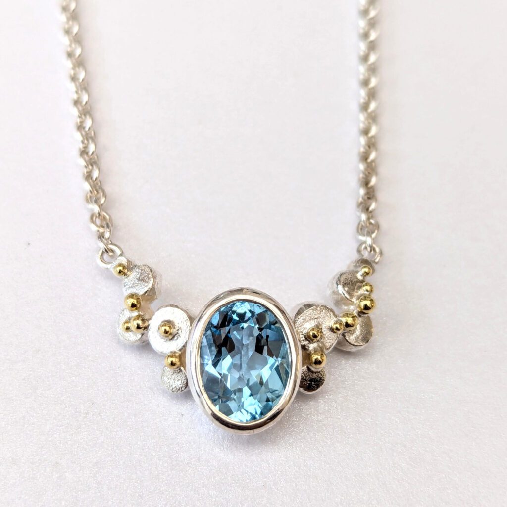 Oval topaz silver and gold Gweal pendant