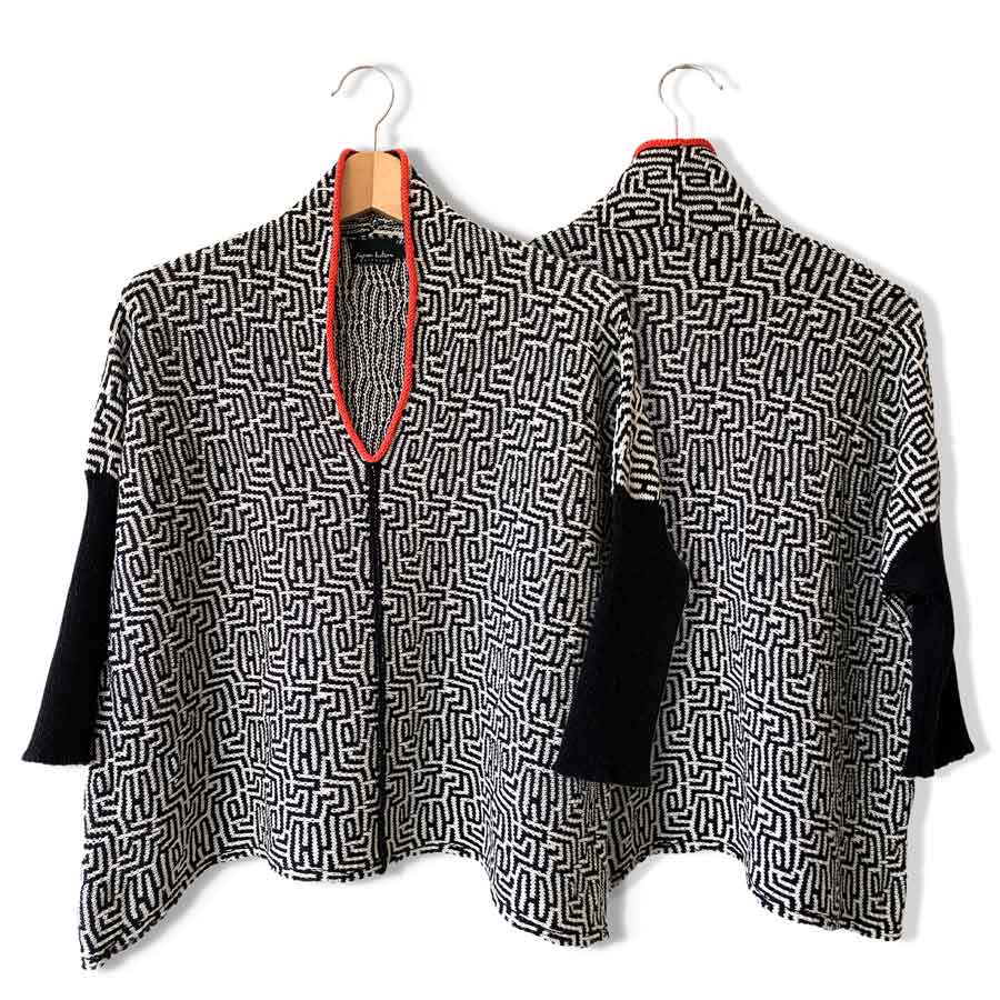 Oversized knit jumper for women knitted in black and off-white in cotton and silk
